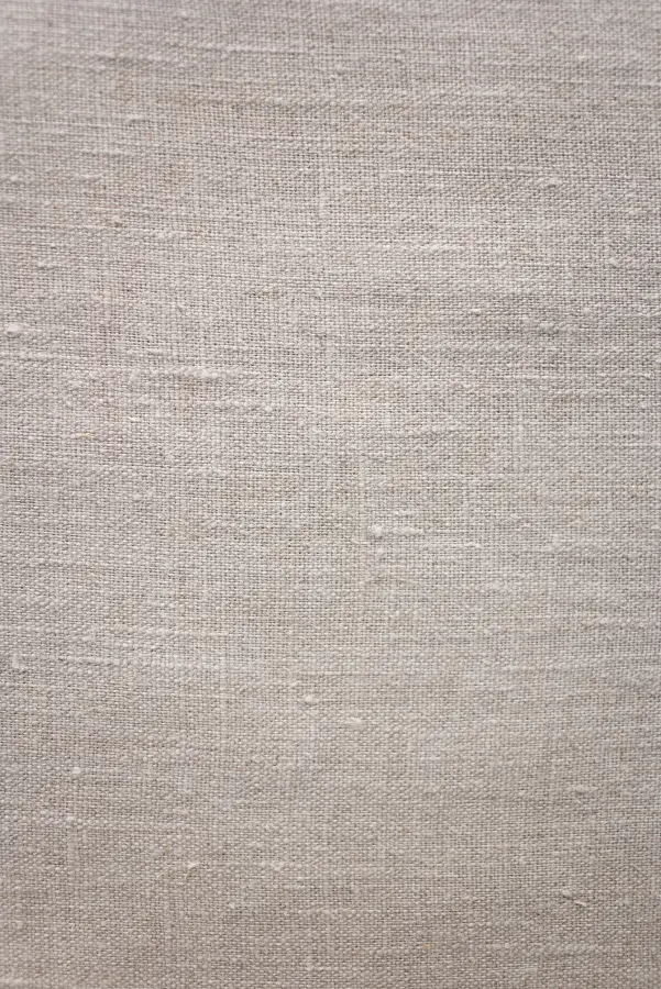 Close-up of woven linen fabric texture.